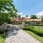 The gate into this Indilatic Florida Riverfront Estate