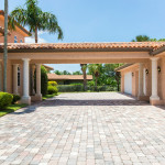 Driveway and coverred alley to the garage of the Riverfront Estate in Indialantic Florida