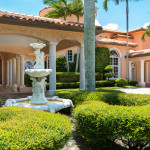 The courtyard entrance with a fountain of the Indialantic Florida Estate