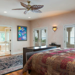 A view of the master bedroom suite of this Indilantic European-style Estate in Florida