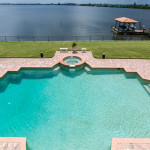 The view to the pool & Indian River from this Indialantic riverfront estate in Florida