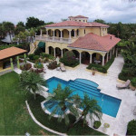 Indialantic luxury home exterior back yard and pool area