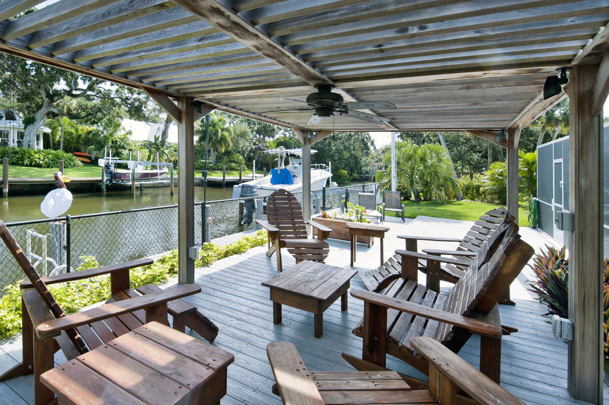 A gorgeous loggia overlooks the private dock and canal      