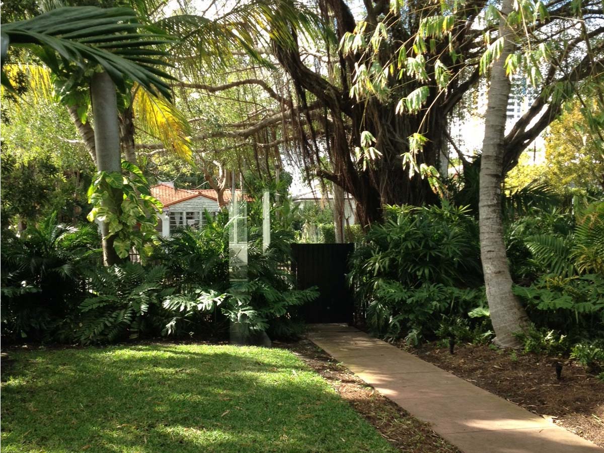 The front yard is facing the quite neighborhood street in the heart of the Art Deco district in South Beach Miami. 