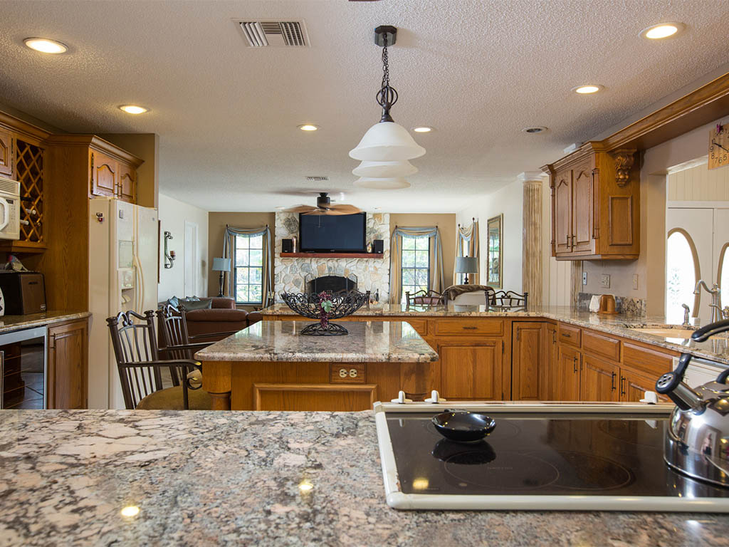 A view of the Kitchen and Family Room of this Country Estate in Vero Beach       