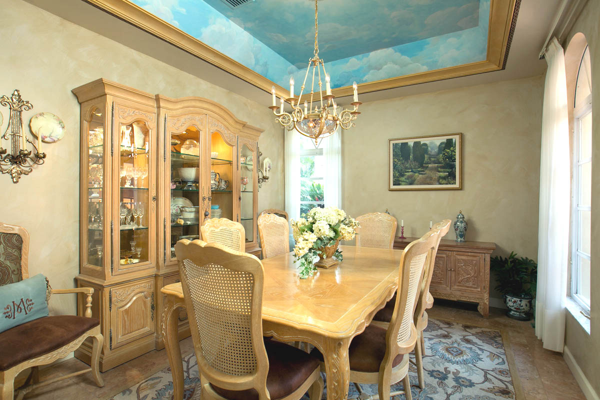 Formal Dining Room with sky mural painted on the tray ceiling & ambient lighting.                     