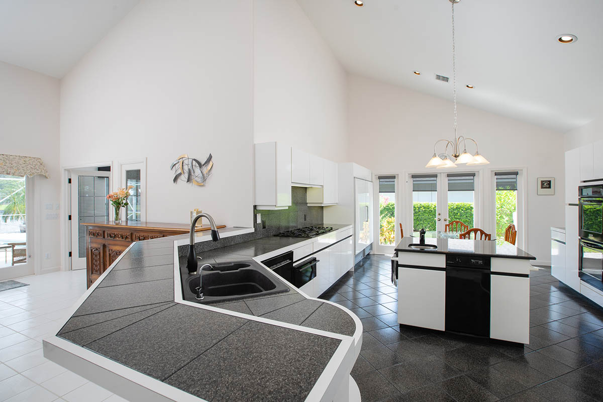 Kitchen with Tile Counters & Subzero Refrigerator