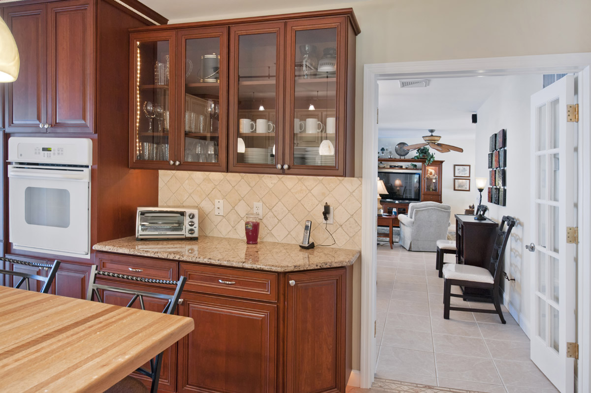 The Kitchen leads into Dining Room and Living Room       