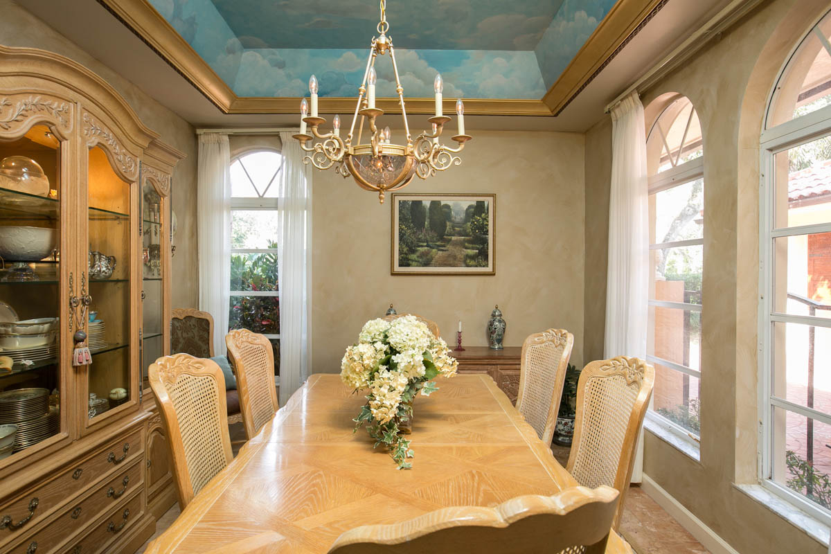 The formal dining room can accommodate all dining furniture and a table for 8.     