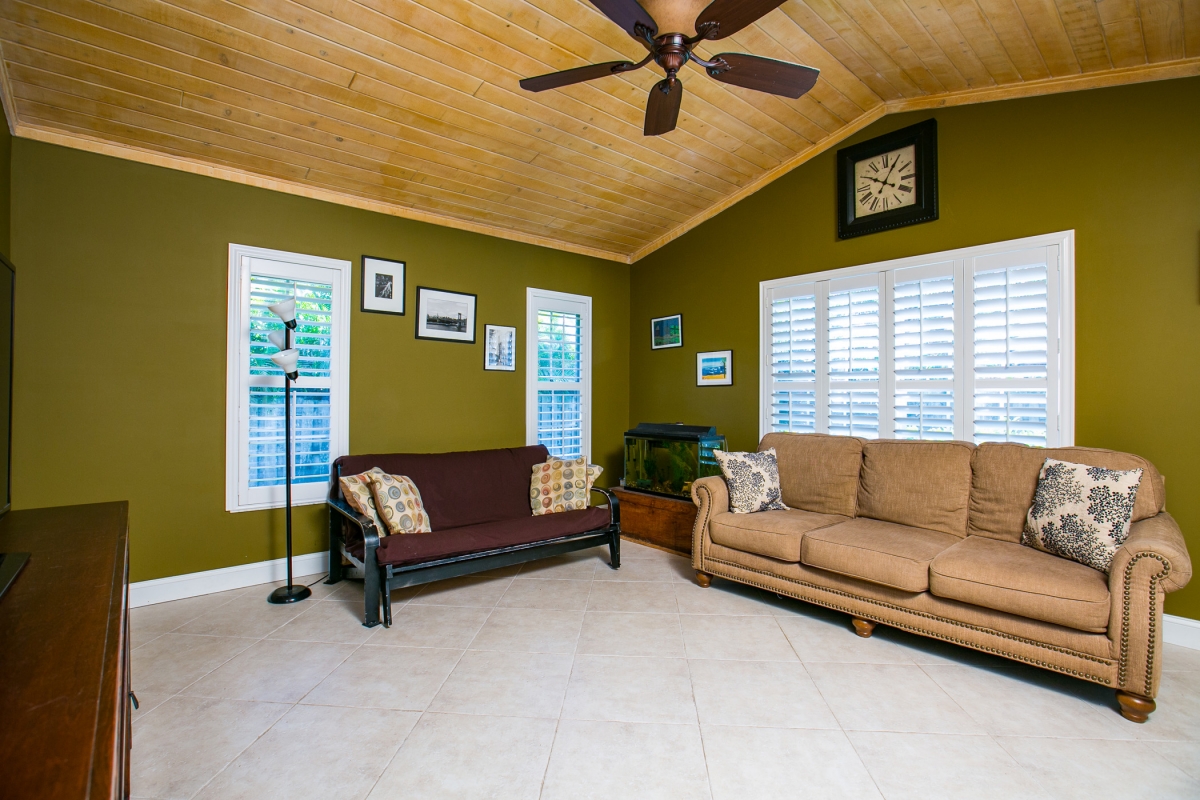 Family room with vaulted tongue-in-groove ceiling 