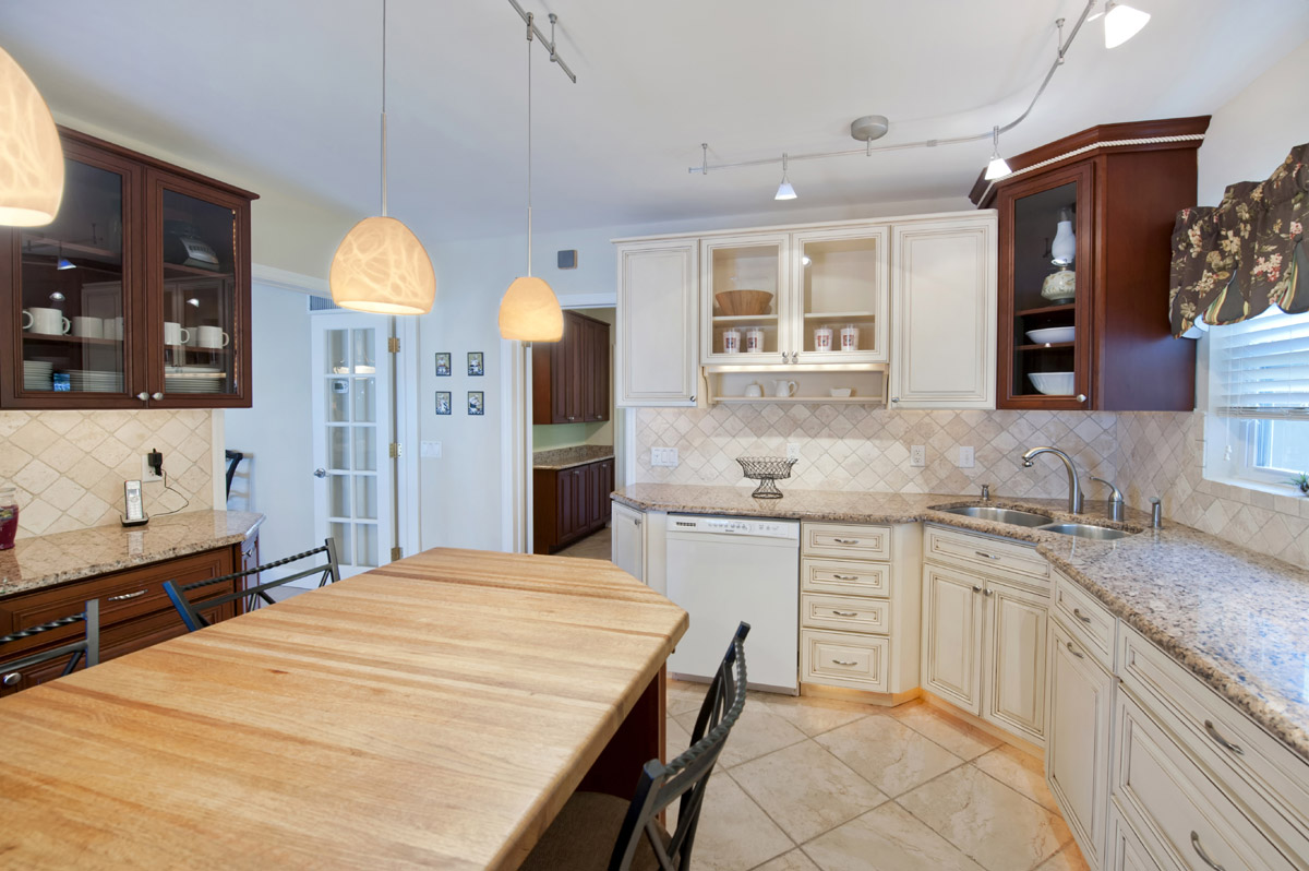 Another view of the kitchen with custom cabinetry