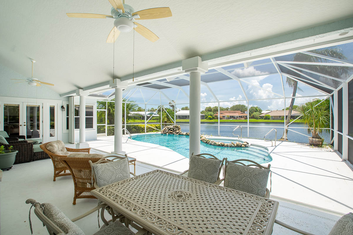 Covered & Screened Porch with Accordion Shutters