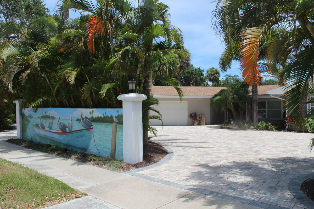 The Front Entryway from main road features a beautiful wall mural depicting native wildlife 