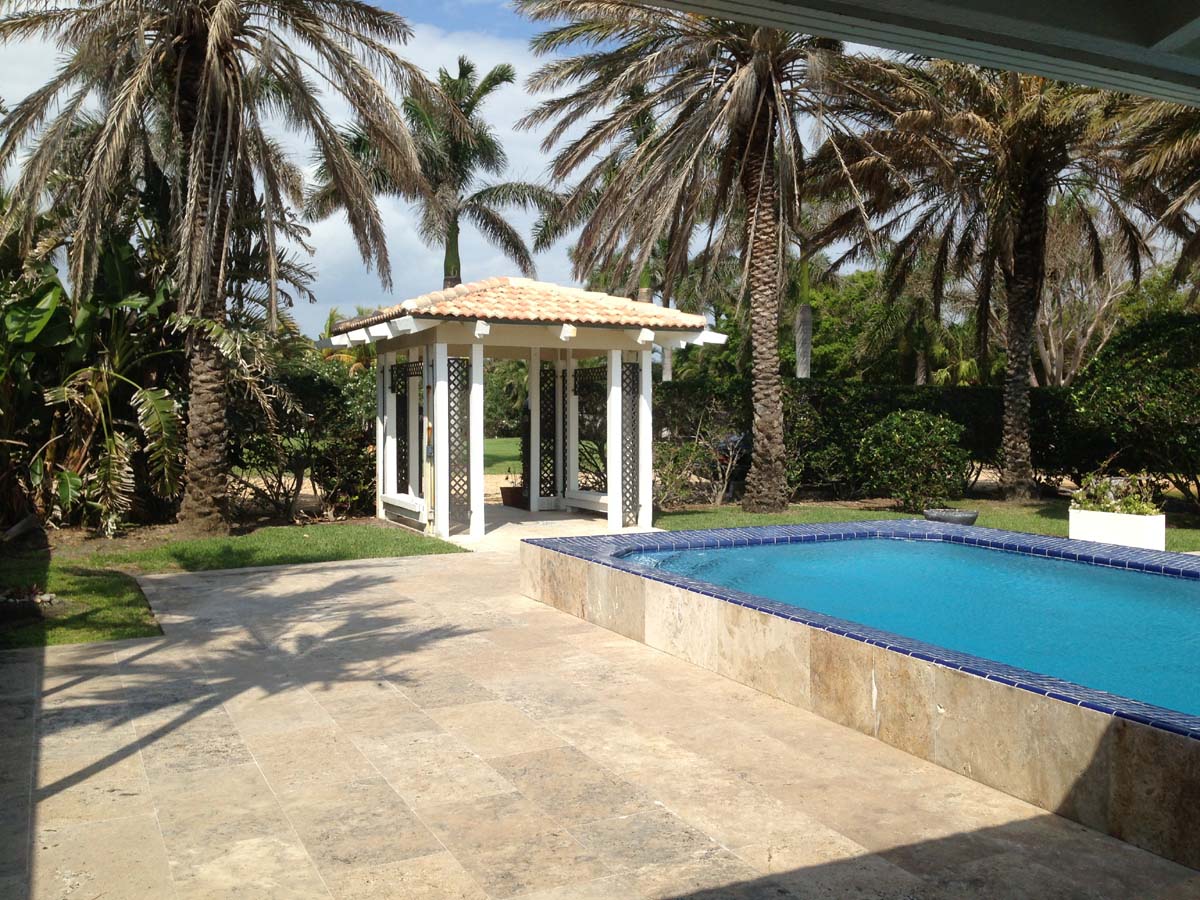 Another view of the front gated entrance from the courtyard pool area.  