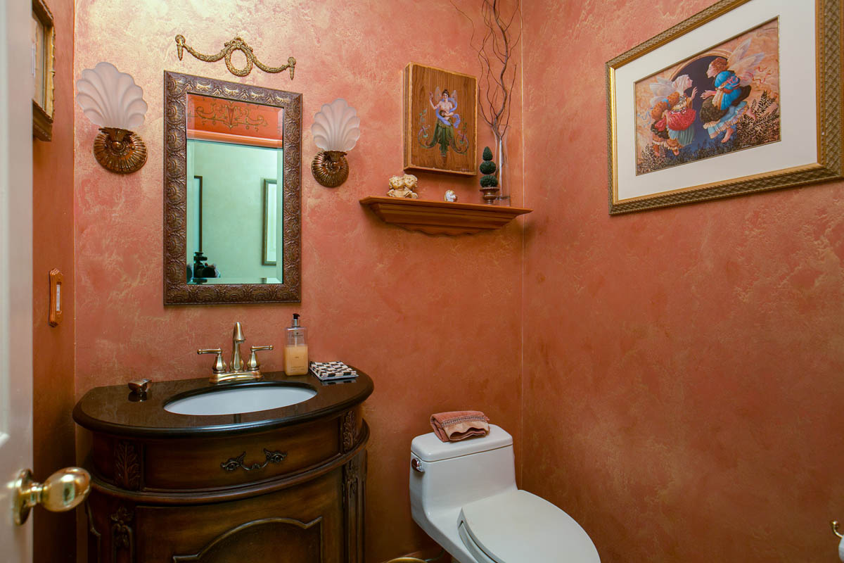 The Power Room has decorative painted walls and crown molding.  