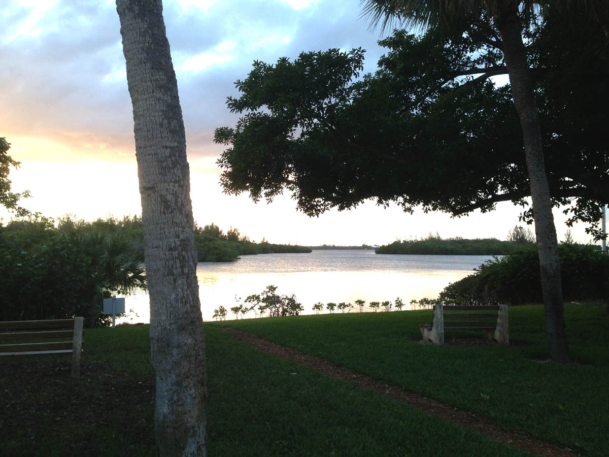 The Castaway Cove VI & V community riverside park at dusk.                 