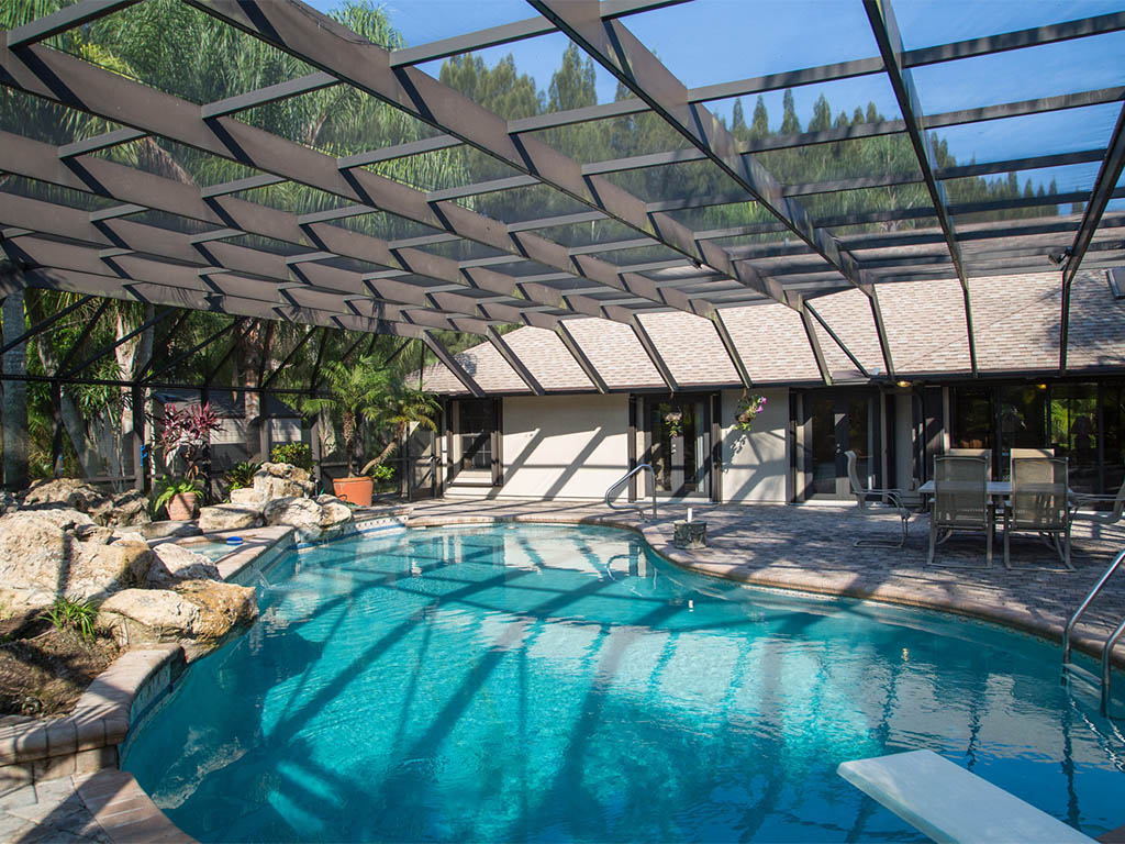 A view of the covered Lanai with Pool and Spa 